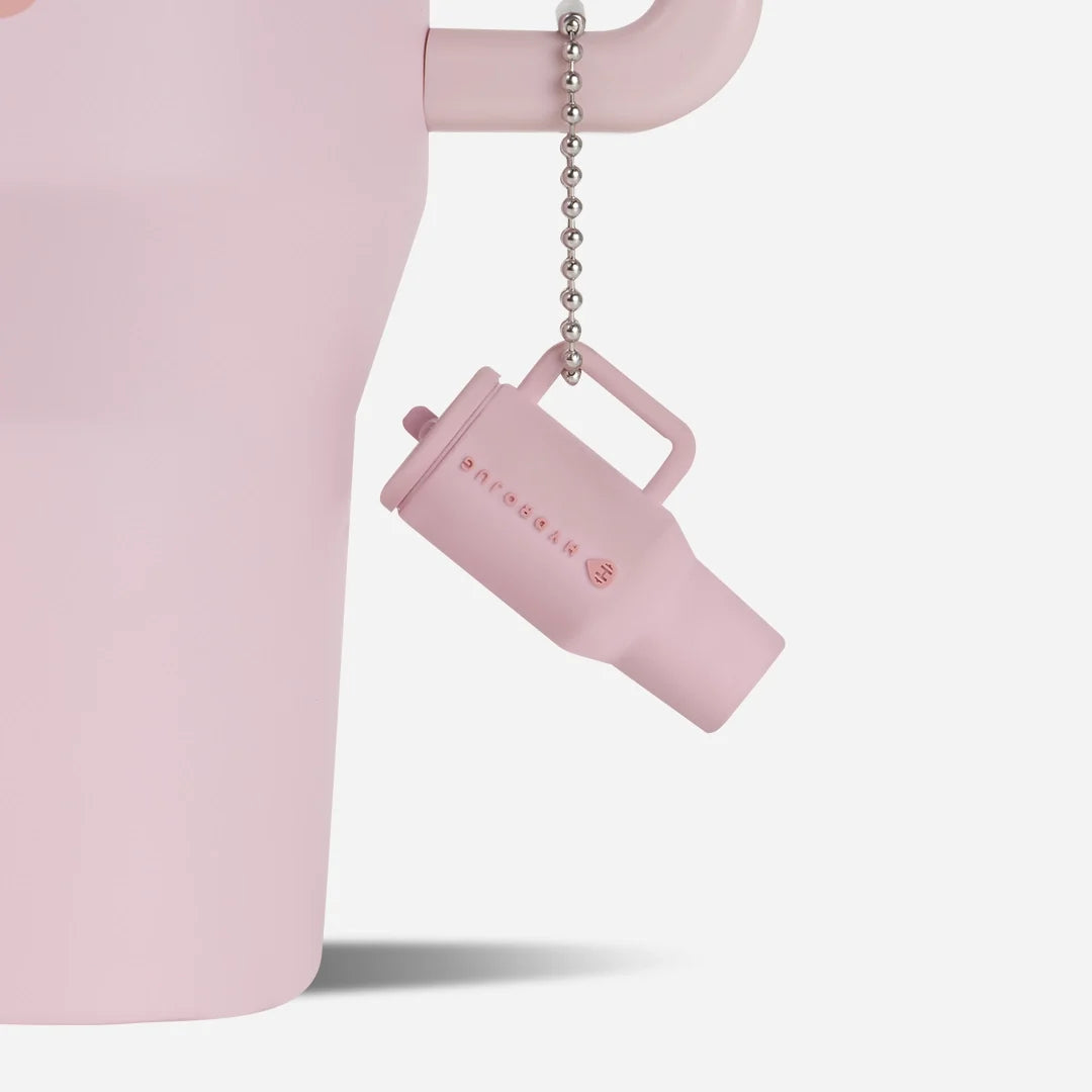 traveler-keychain-d4 Web-TravelerKeychainPhotos-PinkSand2.webp